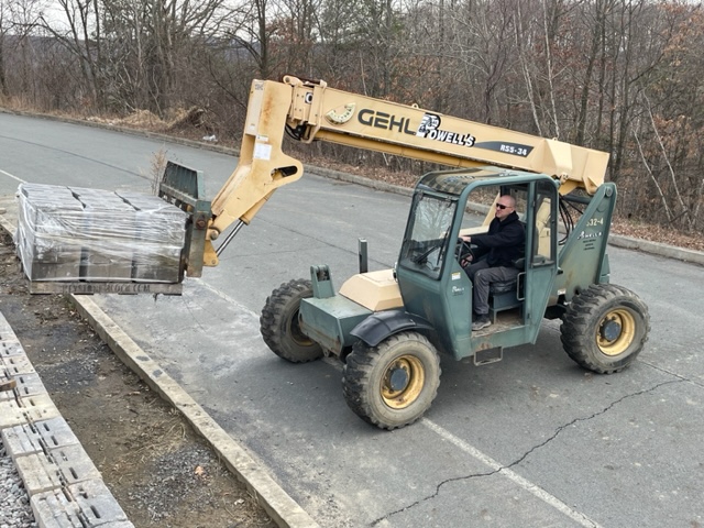 Mills Property Maintenance forklift